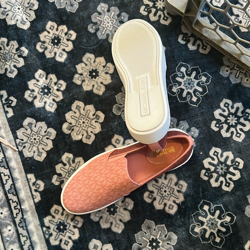 Michael kors pink slip on sneakers.